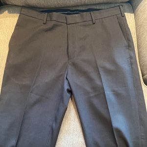 Dark gray men’s Van Heusen dress pants.